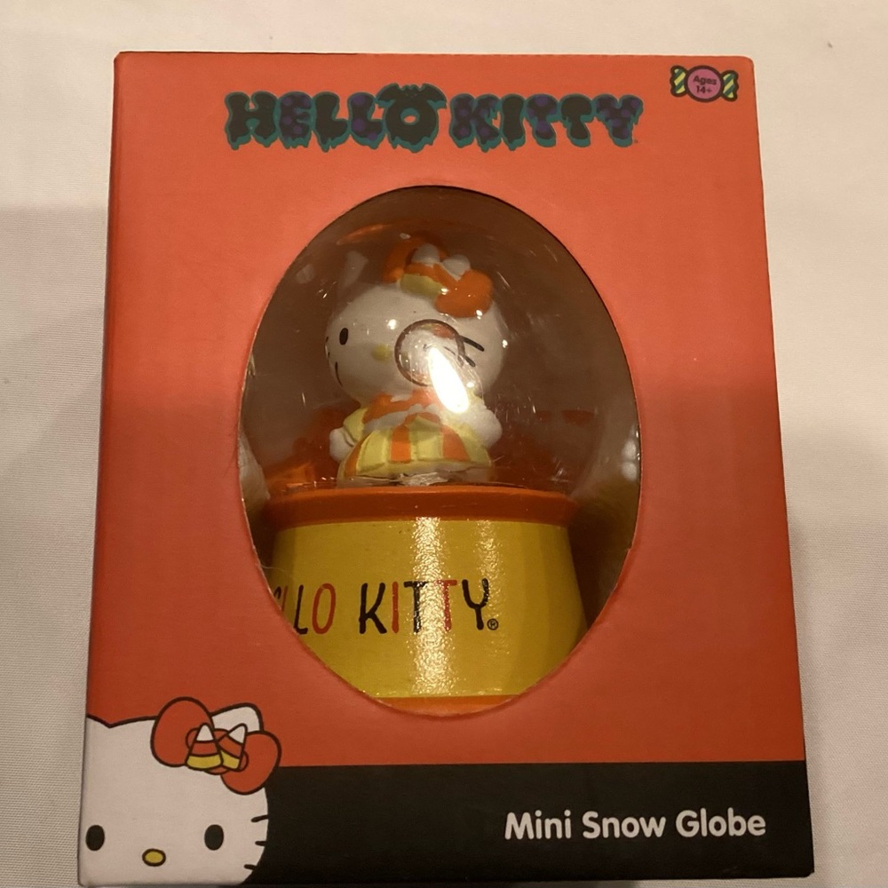 Sanrio Hello Kitty Mini Snow Globe - Orange and Yellow
